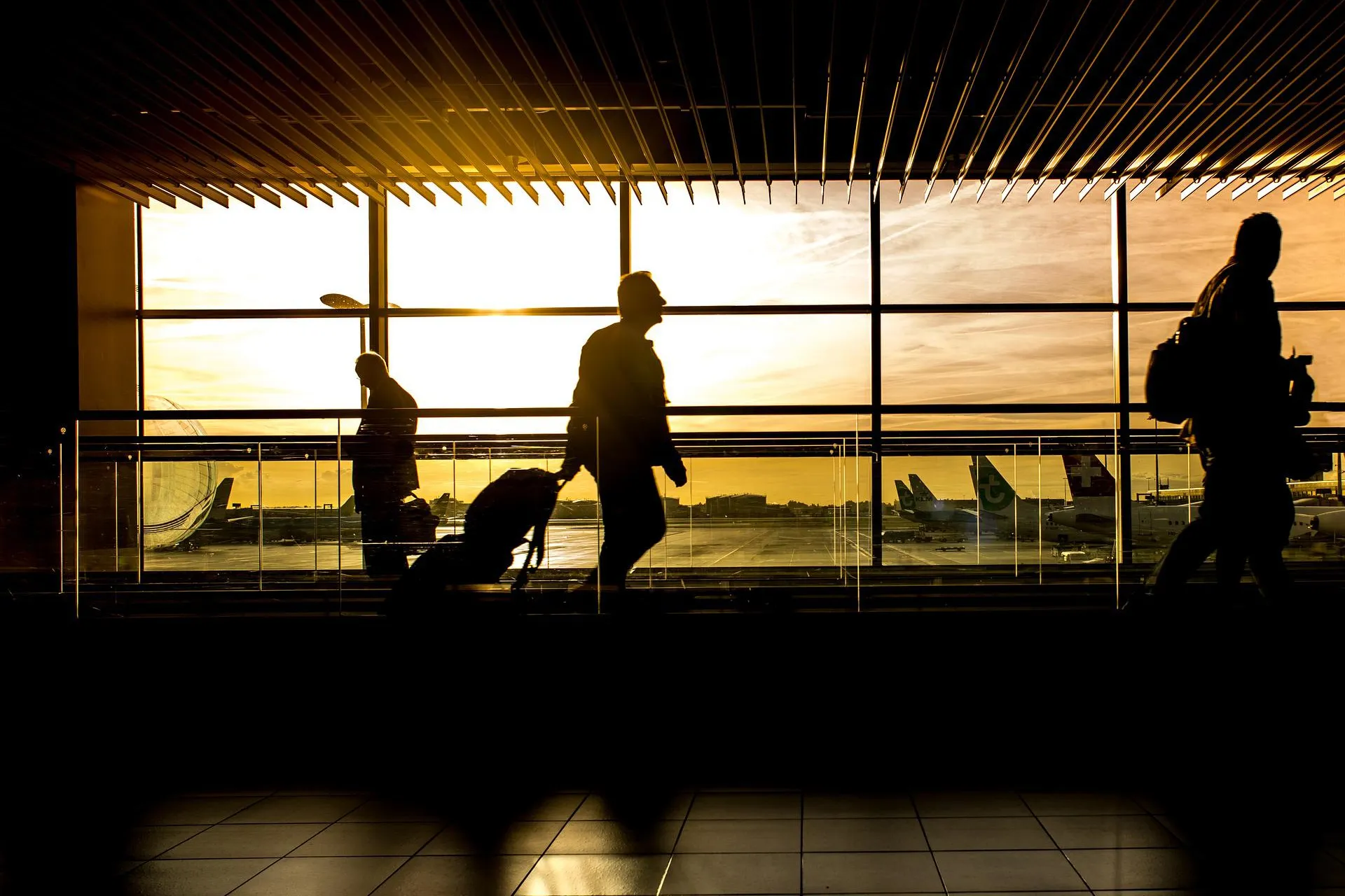Travellers in the airport departure hall